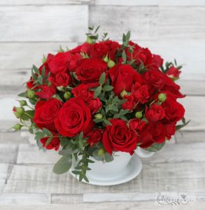 Centerpiece in a cup, with red spray roses, wedding
