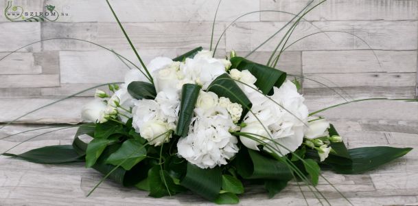 Main table centerpiece with hydrangeas , and roses (white), wedding
