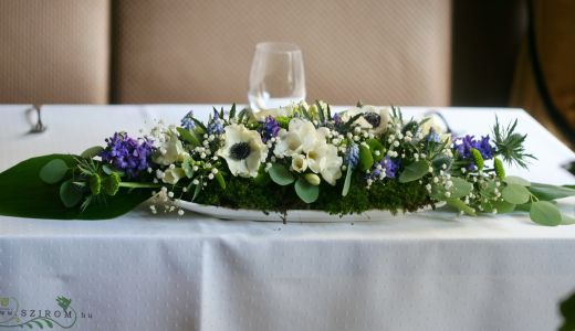 Main table centerpiece with spring flowers, moss, Mezzo Music (hyacinth, anemone, thistle, wild flowers, freesia, blue, white), wedding