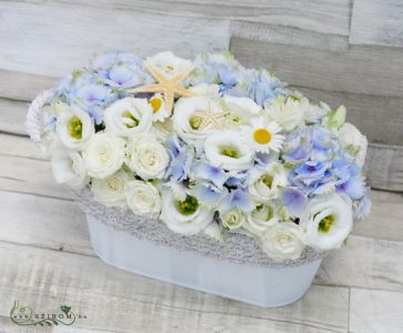 Summer flower arrangement with hydrangeas and sea star