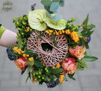 Bouquet with modern bouquet holder with anthurium and roses