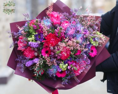 Intensely colored bouquet with purple and pink flowers