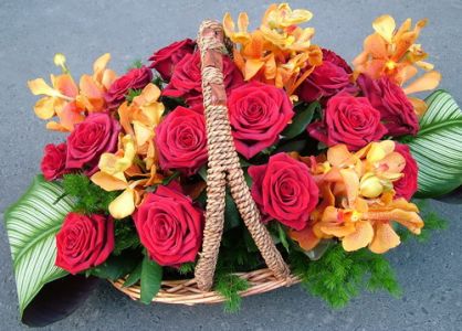 basket of red roses and mokara orchids (25 stems)