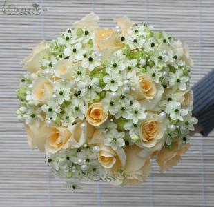 Bridal bouquet with peach roses, white ornithogalums