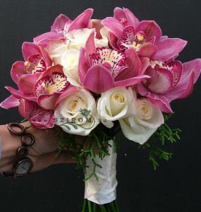 Bridal ouquet with pink orchids, white roses