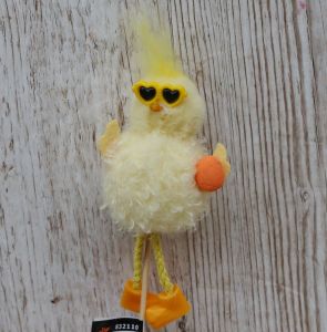 Chicken with sunglasses on a stick