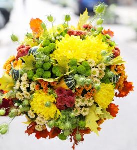 Giant autumn bouquet with color oak leafs, santinis, mini pumpkins