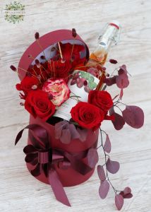 Fruit wine among red roses in cylinder box (8 stems)