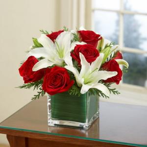 Glaskubus mit Rosen und Lilien (11 Stämme)