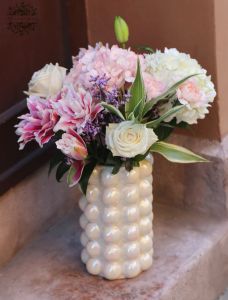 Special pearlescent vase with lilies, hydrangeas, roses