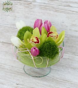 Modern glass bowl with orchid and tulips