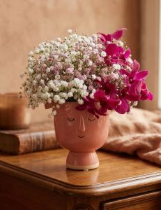 Blumenfrisur mit Dendrobium und Viburnum