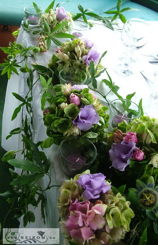 flower delivery Budapest - Main table centerpiece with passion flowers (hydrangea, lisianthus, purple), wedding