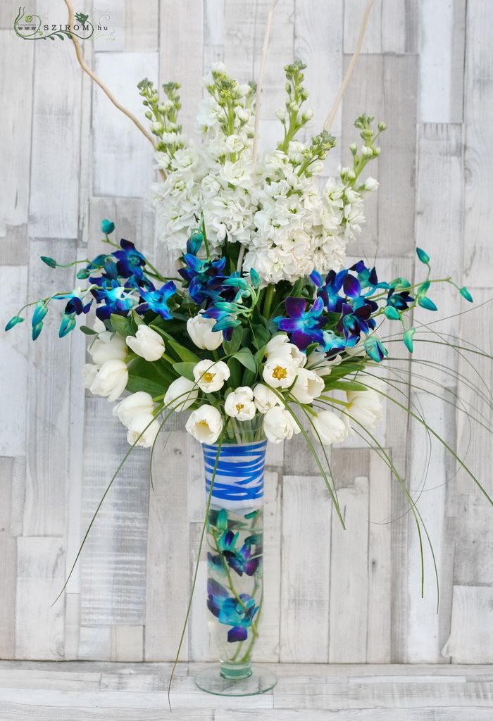 flower delivery Budapest - Tall vase centerpiece with tulips, blue orchids, stockflowers, wedding