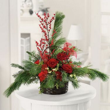 flower delivery Budapest -  basket with red roses and silk pine 