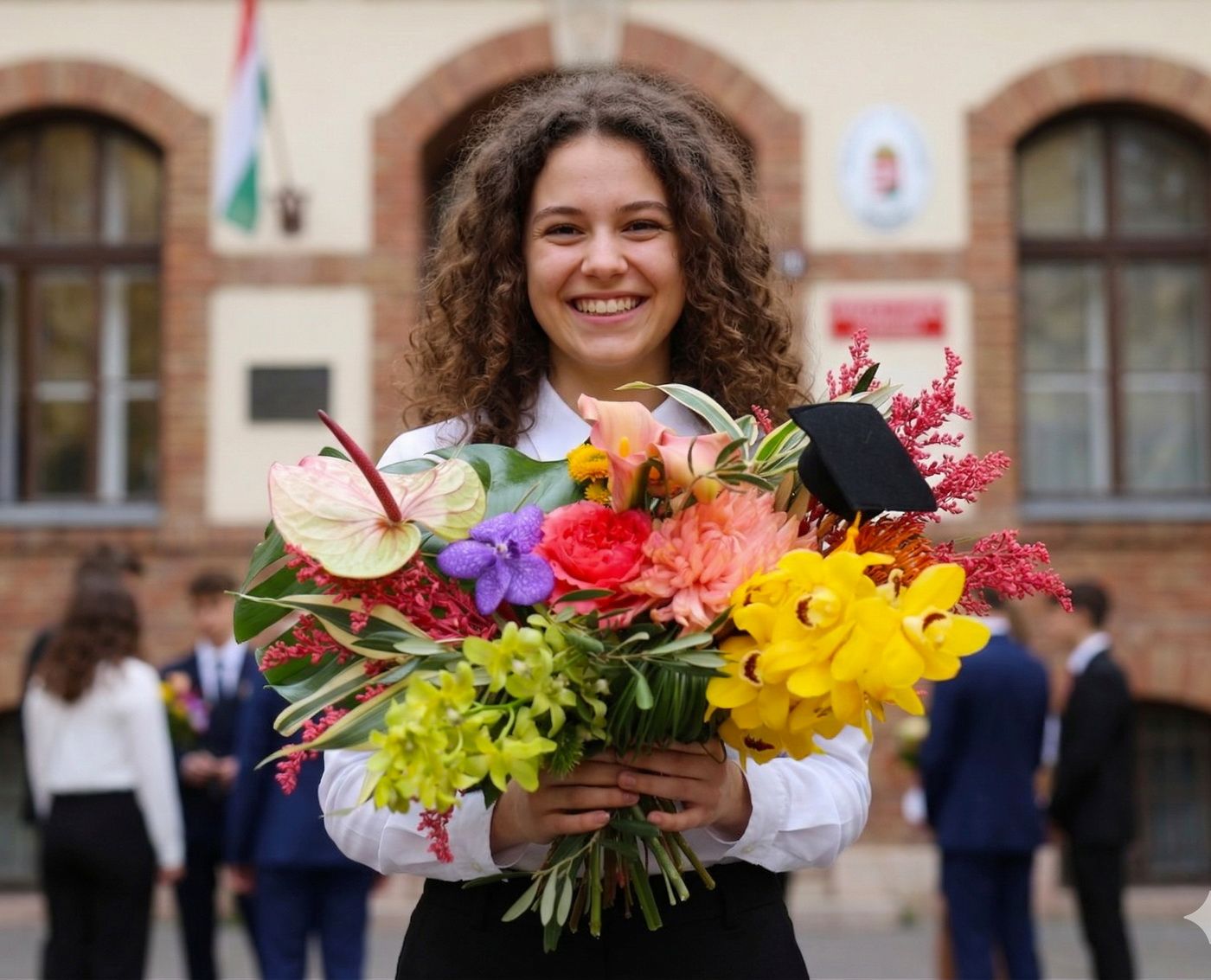Virágküldés Budapest - Trópusi virágos orchideás ballagási csokor