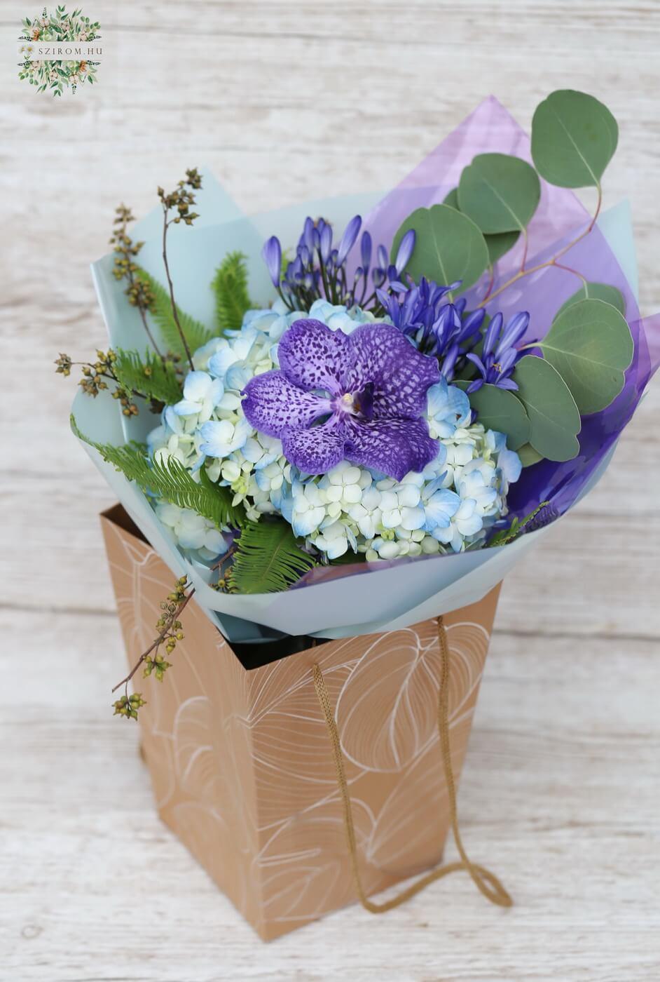flower delivery Budapest - small blue hydrangea-orchid bouquet in a portable floral bag with handles