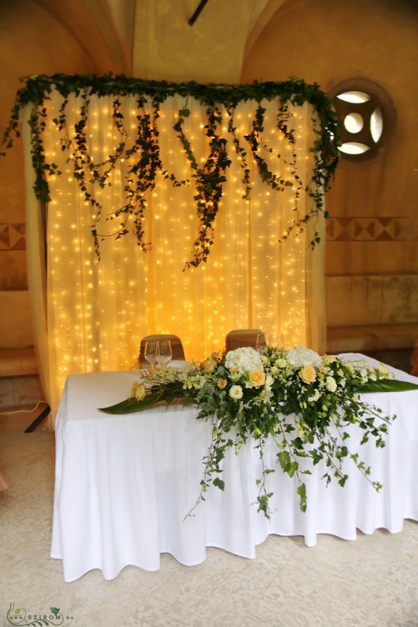 Light courtain, ivy decor, main centerpiece (hydrangea rose, white peach) Vajdahunyad castle