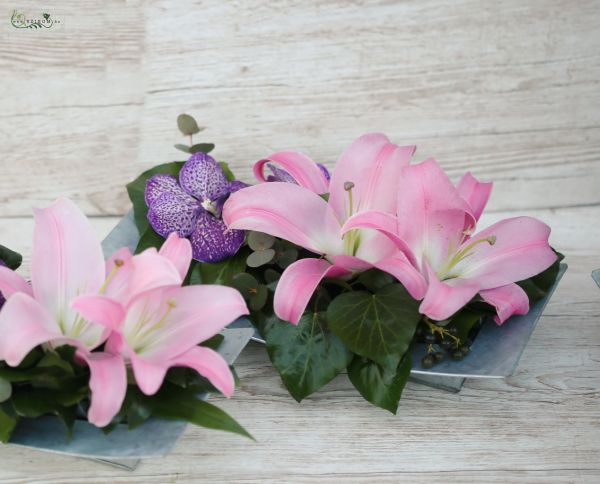 Centerpiece in metallic pot, with pink lilies, purple vanda orchids