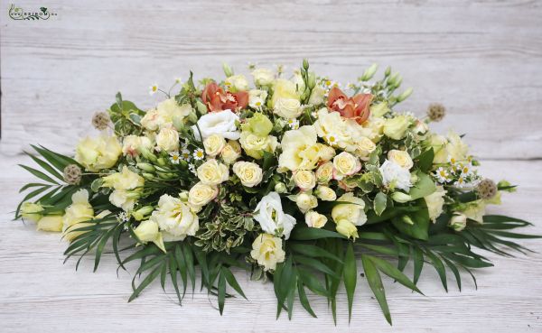 Main table centerpiece in creme color (spray rose, lisianthus, orchid, scabiosa, chamomile)