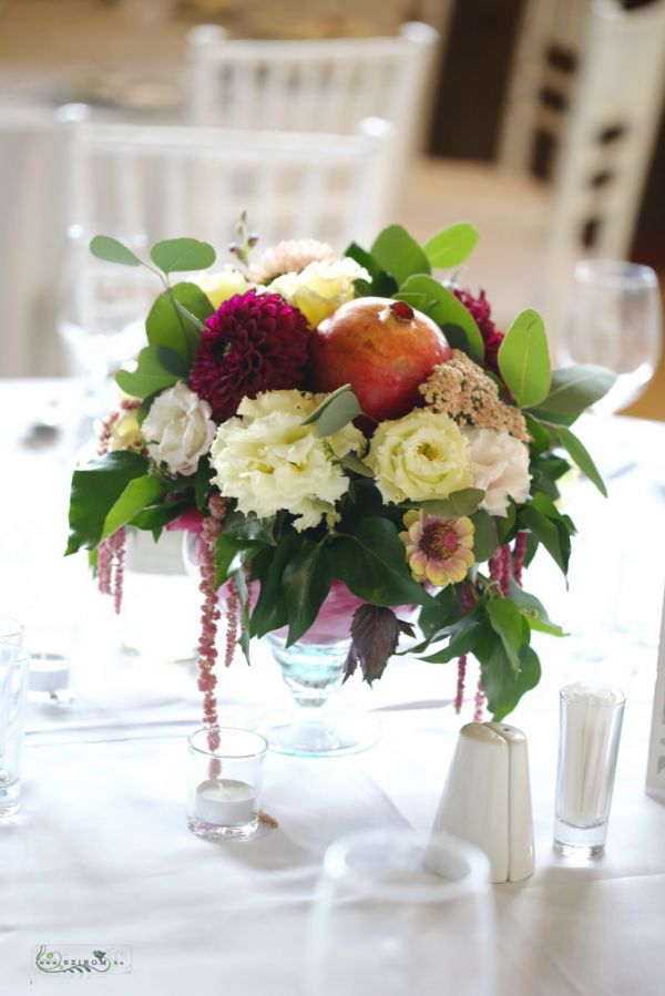 Lush wedding table decoration in chalice, Csónakház Mulató Budapest (lisianthus, dahlia, pomegranate, cream, burgundy)