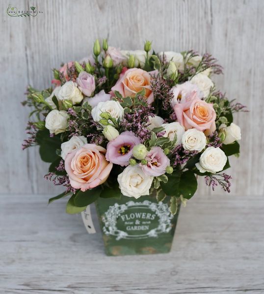 Rustic wooden bench with vintage flowers