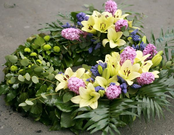 wreath made of asian lilies and spring flowers (80cm)