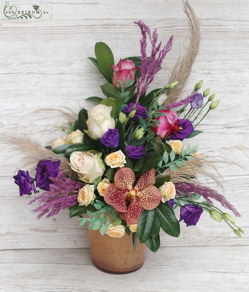 Flower arrangement with vanda orchid, roses, pampas grass 