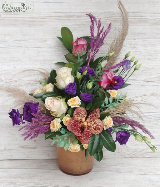 Flower arrangement with vanda orchid, roses, pampas grass 