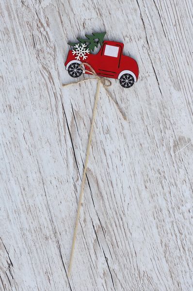 Car figure on stick