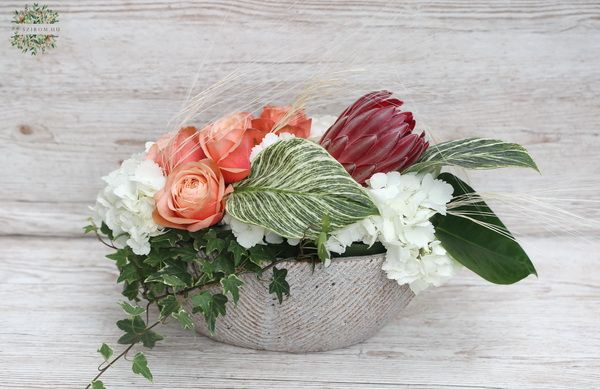 Oval ceramic bowl with roses, hydrangea, protea