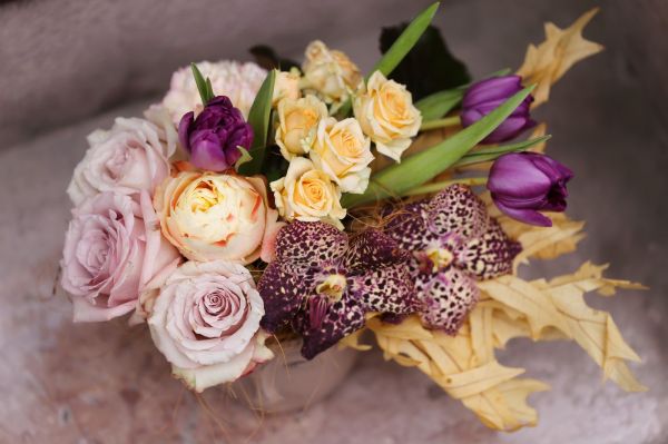 Head pot with windblown flower hair, in the theme of color of the year Mocha Mousse