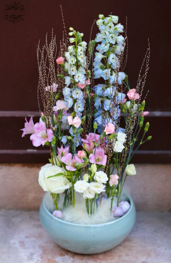 Airy flower bowl with delphinium, lisianthus, pearl catkin, snails