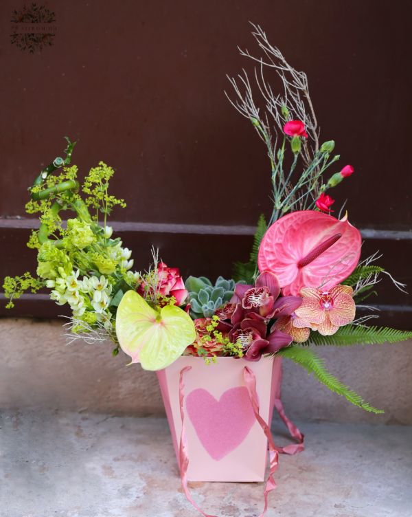 Summer crescent moon flower arrangement with furry echeveria in heart pattern paperbag
