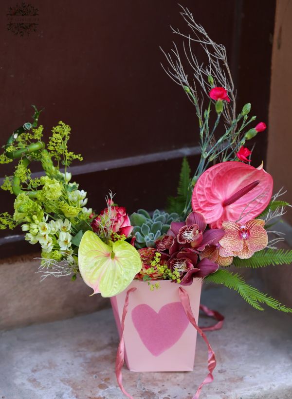 Summer crescent moon flower arrangement with furry echeveria in heart pattern paperbag