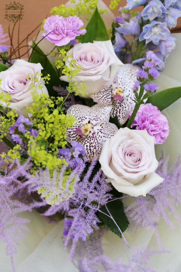 Lavender purple bouquet with orchids, delphiniums, roses