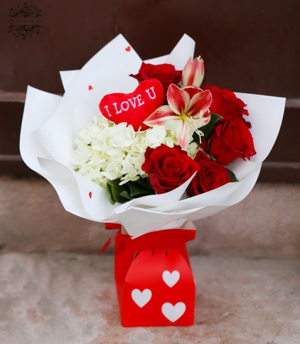 Romantic bouquet with hydrangea, red roses, amaryllis, plush heart and paper vase with hearts