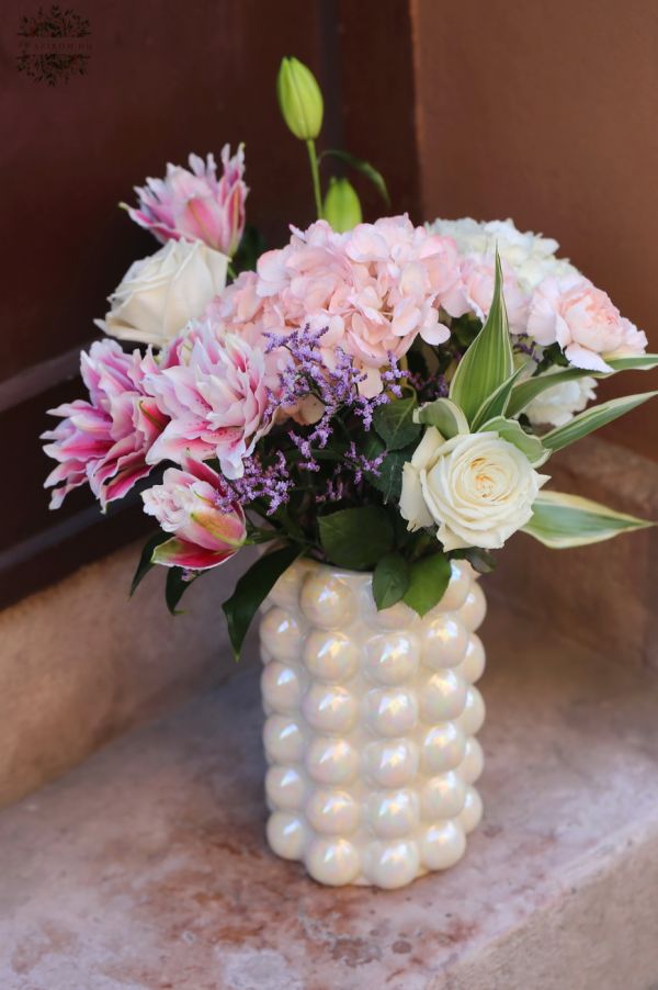 Special pearlescent vase with lilies, hydrangeas, roses