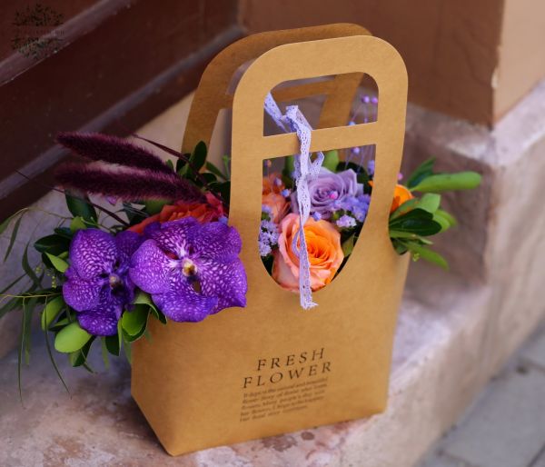 Summer vibe flowerbag with vanda orchids and coral roses