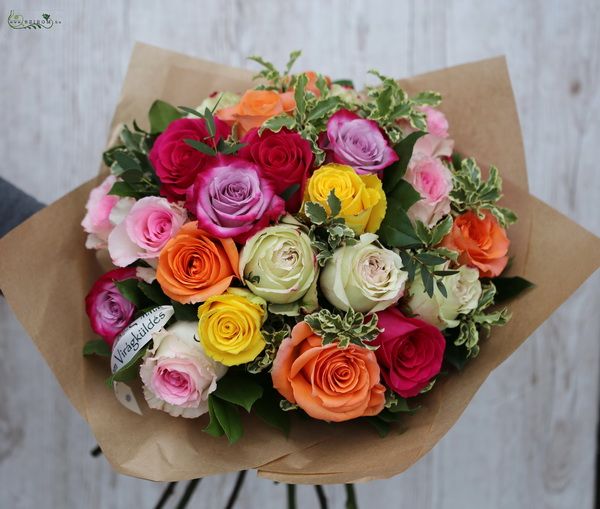 25 colorful roses in a round bouquet