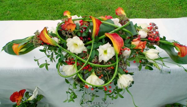 Main table centerpiece with orange callas, Hungarian Railway Museum, wedding