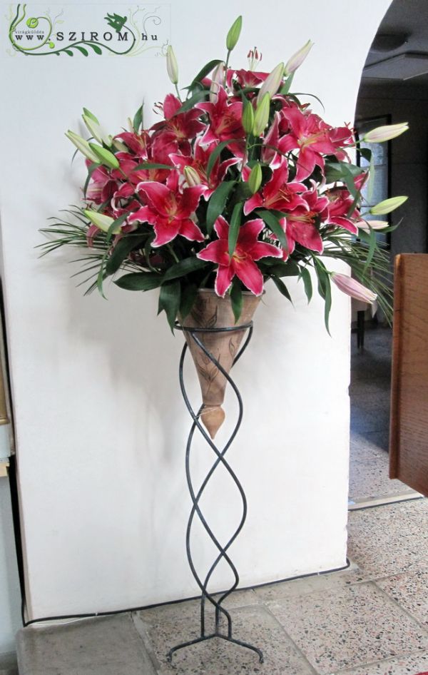 standing flower arrangement with lilies, wedding