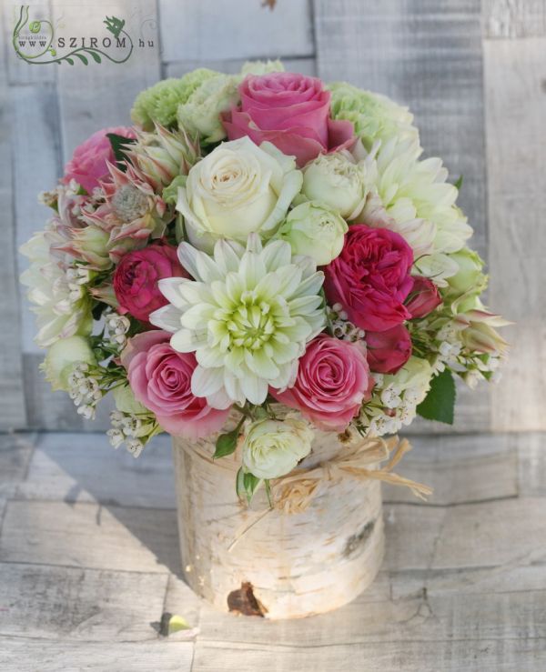 Log centerpiece with dahlias (pink, cream), wedding