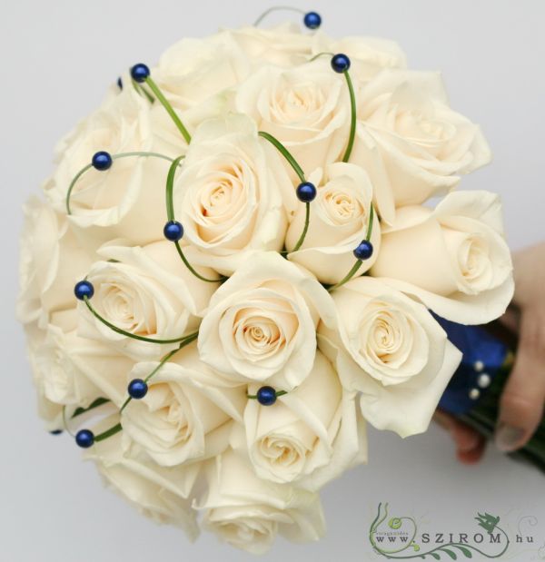 Bridal bouquet with cream roses, blue pearls