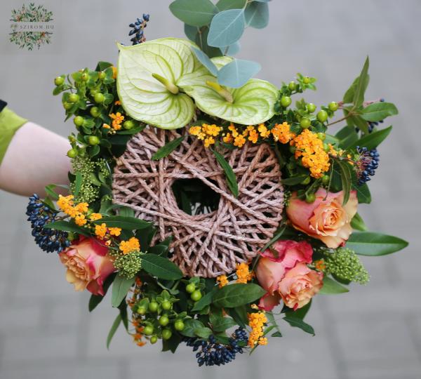 Bouquet with modern bouquet holder with anthurium and roses