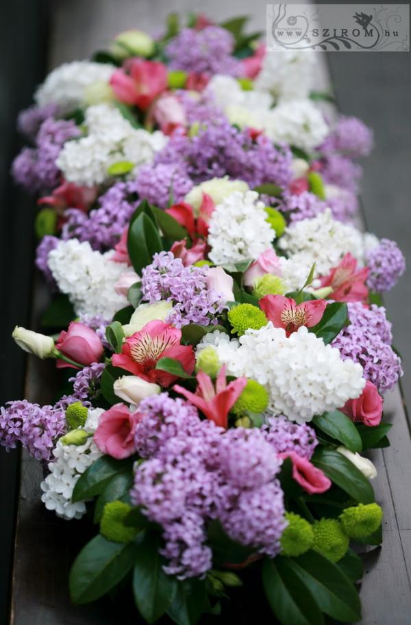 Main table centerpiece with lilac (lisianthus, Peruvian lilies, daisis, purple, white), wedding