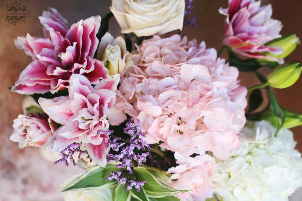 Special pearlescent vase with lilies, hydrangeas, roses