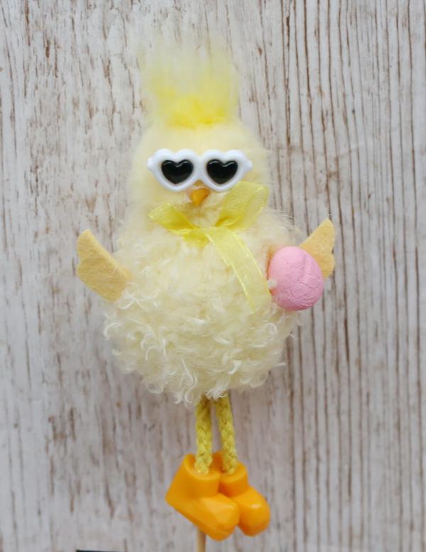 Chicken with sunglasses on a stick