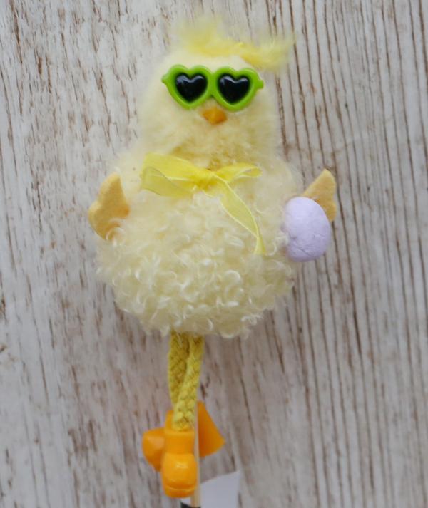 Chicken with sunglasses on a stick