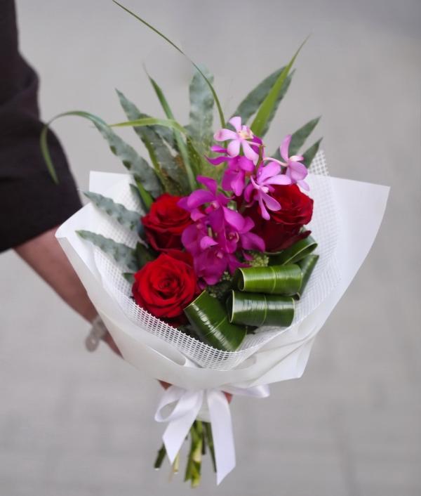 Small red rose bouquet with mokara orchid - original product photo with AI background